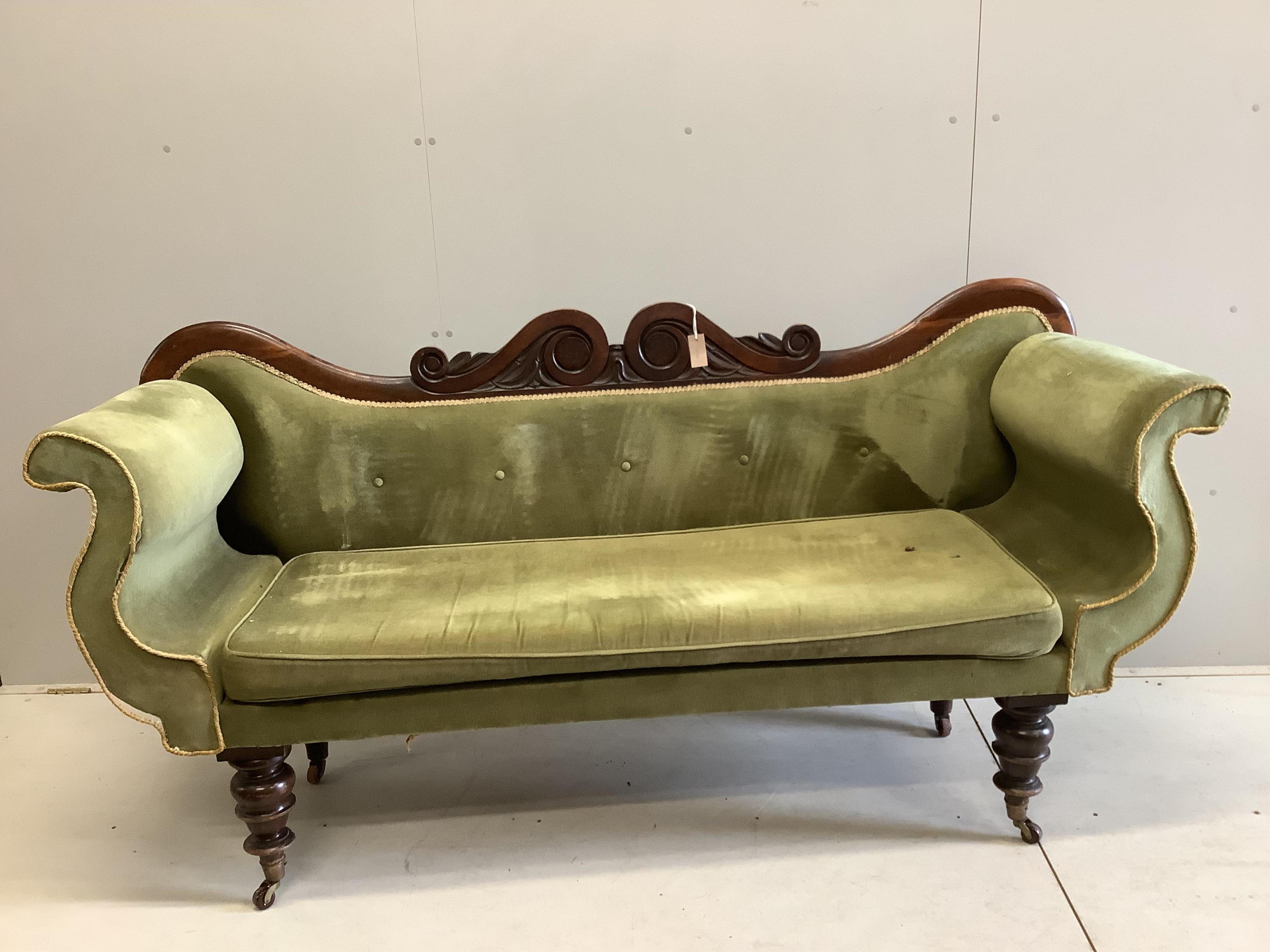 An early Victorian mahogany upholstered scroll arm settee, width 200cm, depth 62cm, height 100cm. Condition - fair